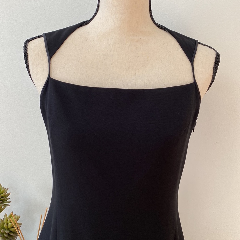 COPY - Black A-line sleeveless gown.  Incredible neckline!